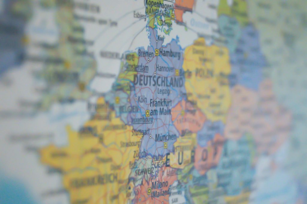 pexels photo 269790 269790 Close-up view of Germany on a colorful world map showing major cities.